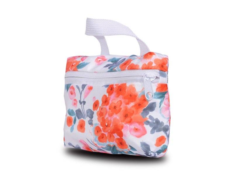 Folded fanny pack with shattered flowers.